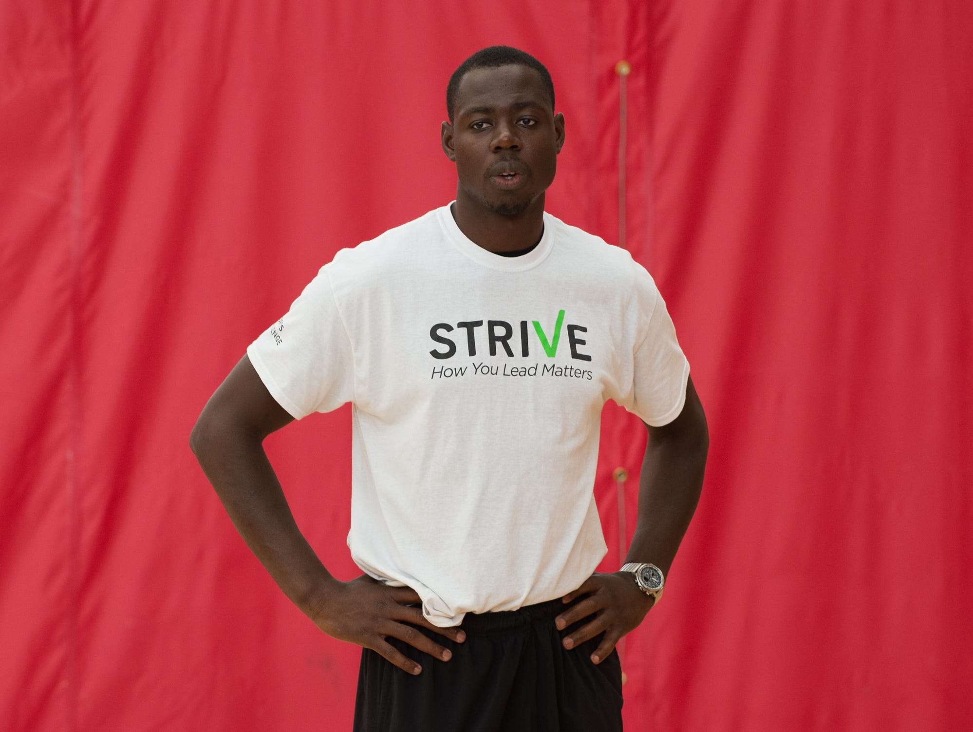 St. Andrew's School alumni, Eric Boateng, working with basketball players during the Strive Sports Challenge at St. Andrew's School in Middletown, Del,.
