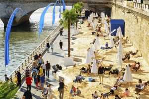 Paris, France - August 13, 2014: The public beach on the banks of the River Seine in Paris. Paris is one of the most popular tourist destinations in Europe.
